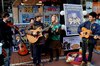 Cathy Davey and Neil Hannon busking in aid of Dogs in Distress